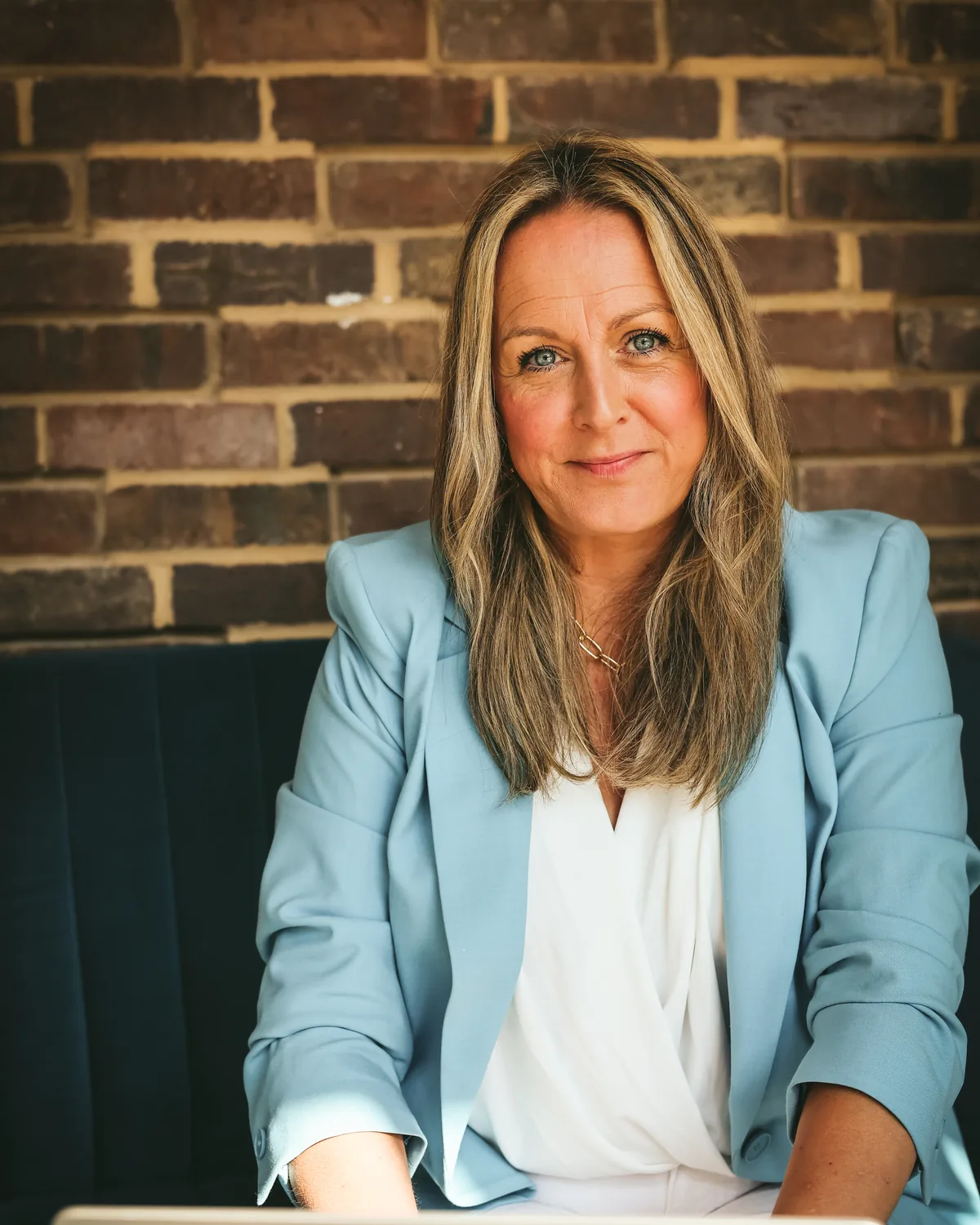 Emma Williams, founder of ATO Insight Solutions, at her laptop